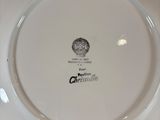 a white plate with a black and white design on it