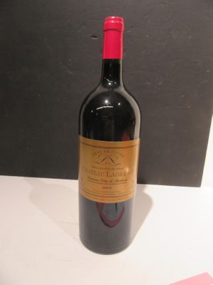 a bottle of wine that is sitting on a table