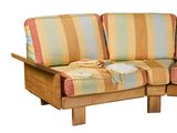 a couch with a blanket on it and a blanket on the back of it