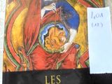 the book is sitting on a table with a note attached to it