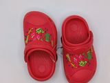 pair of red children ' s clogs with colorful flowers on them