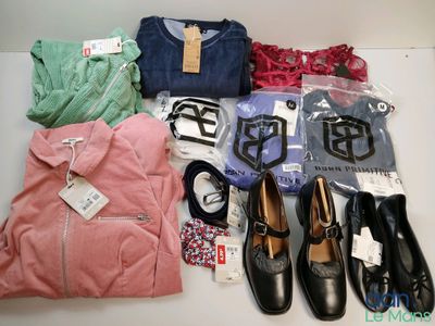 several pairs of shoes, a shirt, a pair of pants, a pair of shoes, a pair of shoes, and a bag of clothes