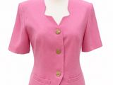 a close up of a pink jacket on a mannequin mannequin