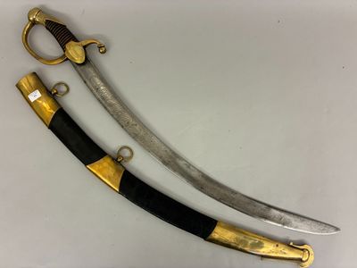 two swords with gold and black handles on a white surface