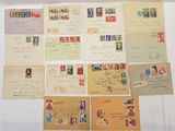many different types of stamps and envelopes on a white surface