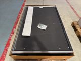 a metal table with a piece of paper on top of it
