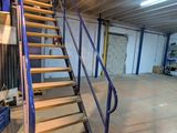 a staircase going up to the top of the stairs
