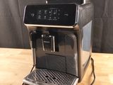 an image of a coffee machine on a wooden table