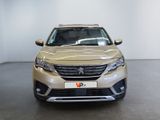 a picture of a car parked in a showroom