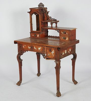 a small wooden desk with a mirror on top of it