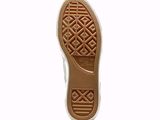the sole of a pair of white shoes with brown soles