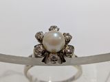 sterling silver ring with a pearl and diamonds