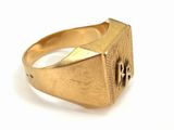 an image of a gold ring with a cross on it