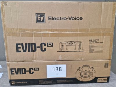 two boxes of electronic devices are stacked on top of each other