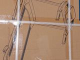 a cardboard box with a drawing of a crane on it
