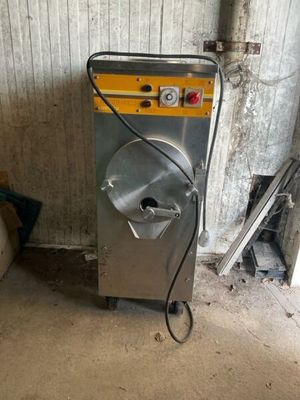 a machine that is sitting in the corner of a room