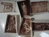 many old photos of people and animals on the table