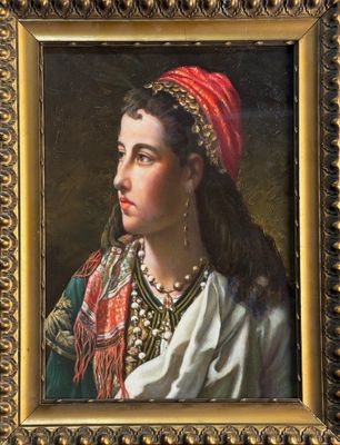 portrait d'une jeune femme coiffée d'une coiffe rouge