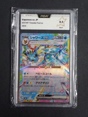 a close up of a pokemon card in a plastic case