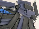 a lot of blue and black tools laying on a table