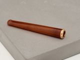 a pen that is laying on top of a piece of paper