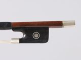 an image of a violin bow with a wooden handle on a white background