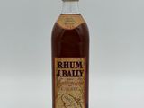 bottle of rum in front of a white background