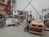 an image of a room with a lot of items on the floor