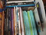 a box full of books sitting on a table