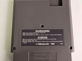 a close up of a video game on a white surface