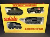 a box with three different military vehicles in it