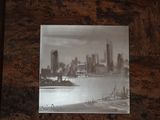 a picture of a picture of a city in a picture frame