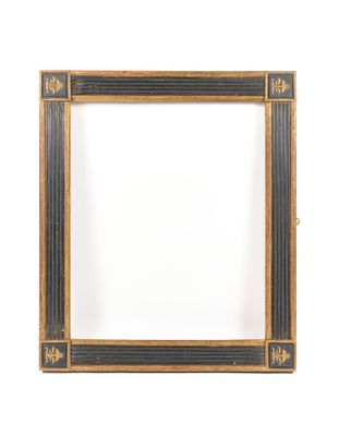 an old picture frame with a black and gold border