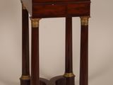 an image of a small wooden table with two legs and a wooden top