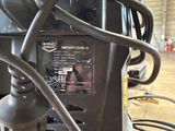 a close up of a machine in a warehouse