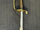 a picture of a sword that is laying on the ground