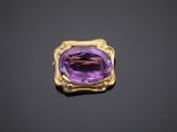 an amethorate and gold broochle, by van cleef