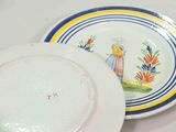 two plates that are sitting on a table