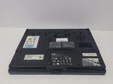 a laptop that is sitting on a white table
