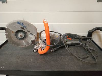 someone is using a circular saw to cut a piece of wood