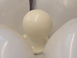 a white object in the middle of a white bowl