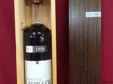 an image of a bottle of wine in a wooden box