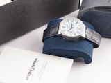 a watch that is sitting on top of a blue case