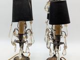 pair of crystal and brass table lamps with black shades