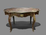 a small table with a marble top on a gray background