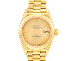 une montre Rolex pour femme en or jaune