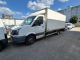 a picture of a white truck parked in a parking lot