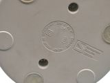 an image of a close up of a metal plate with holes
