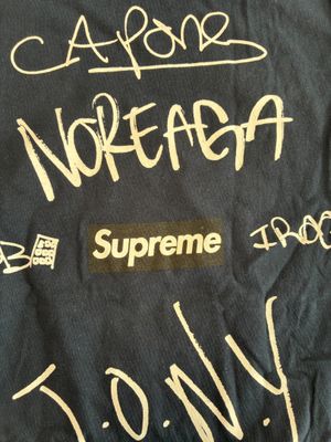 a black jacket with writing on it that says supreme