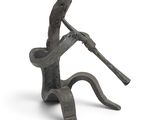 statue of a man holding a wooden stick with a snake around his neck